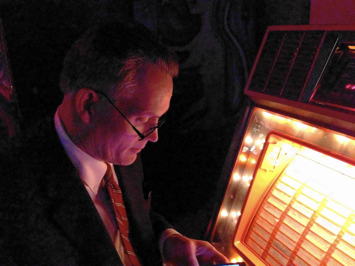 Novelist and Pierce County prosecutor Mark Lindquist at Bob's Java Jive in Tacoma, Wash. The dive bar appears in his third novel, "Never Mind Nirvana."