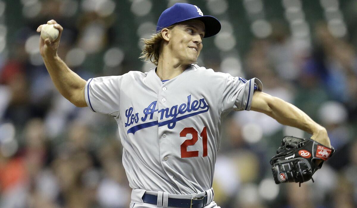 Dodgers' Zack Greinke pitches during a Dodgers 8-2 win over the Milwaukee Brewers on Tuesday.