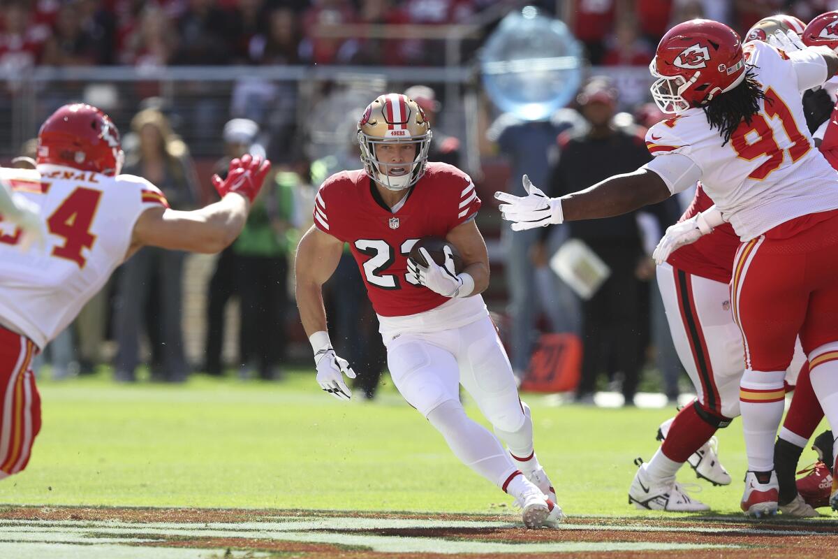 San Francisco 49ers running back Christian McCaffrey runs the ball in the first quarter against the Kansas City Chiefs.