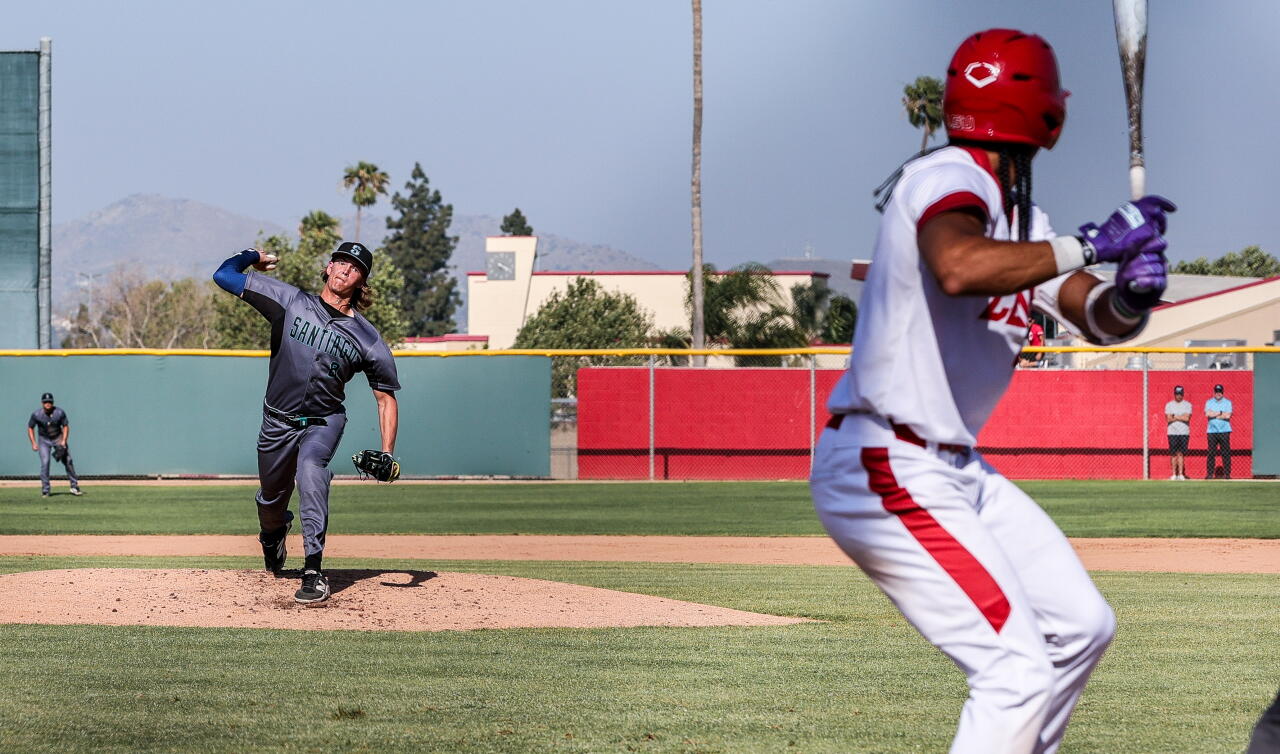 UCLA pitchers Justin Lee and Chris Grothues celebrate after a win.