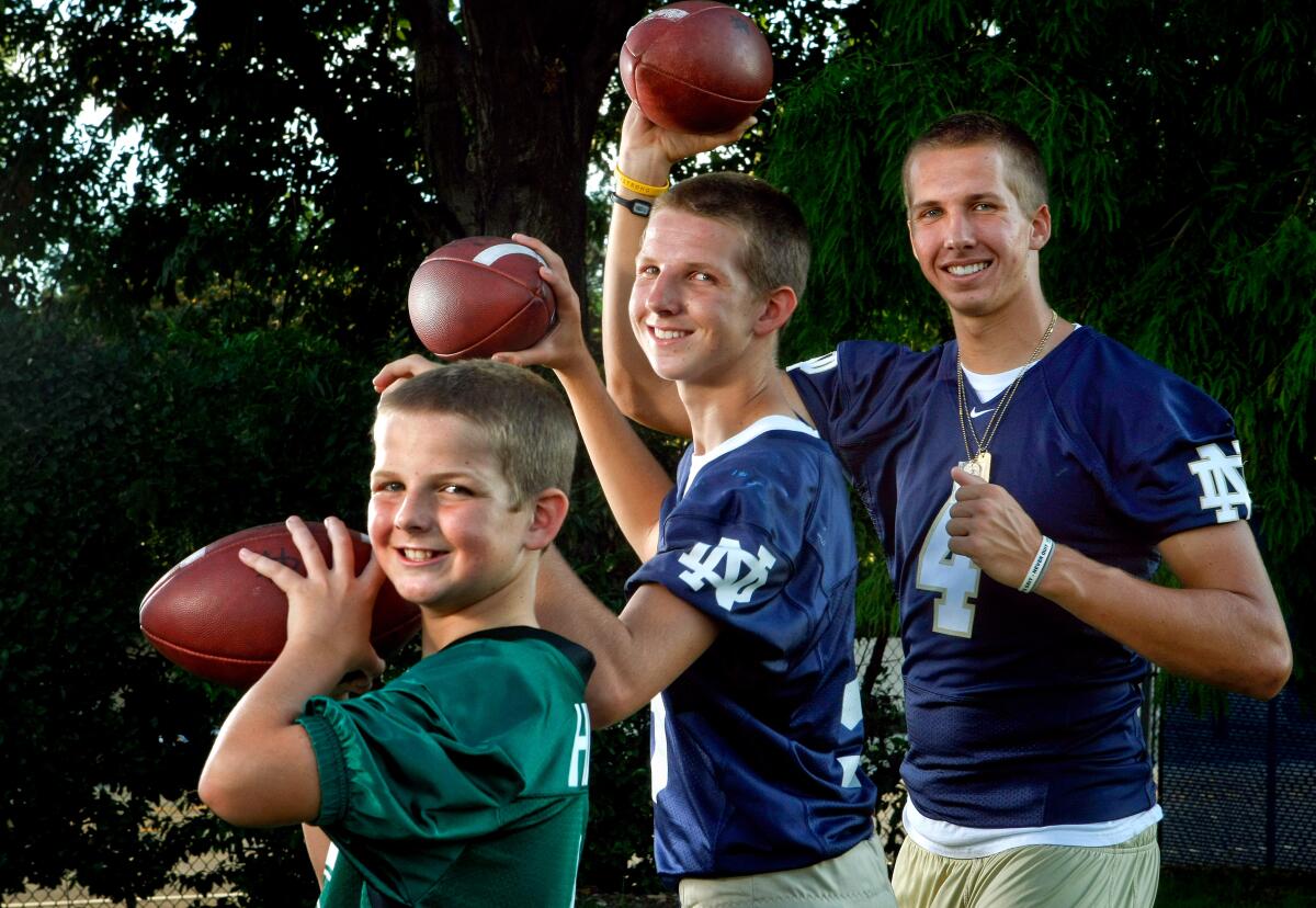 Hilinski brothers Ryan, left, Tyler, center, and Kelly in 2011.