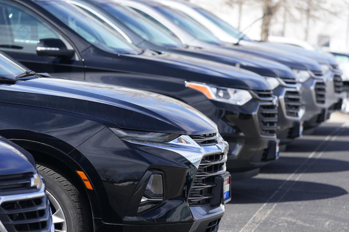 Blazer and Traverse SUVs at a Chevrolet dealership in Colorado.