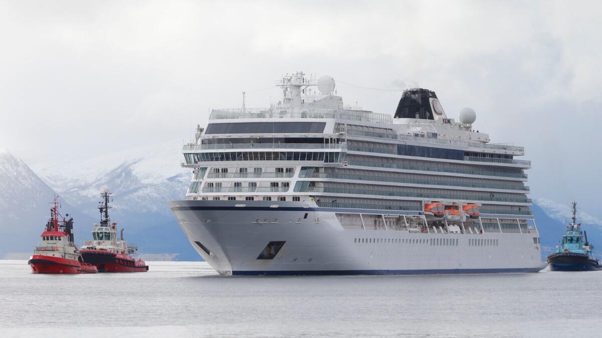 Cruise ship Viking Sky arrives at Molde, Norway, after engine failure the day before in windy conditions led to a helicopter rescue effort.