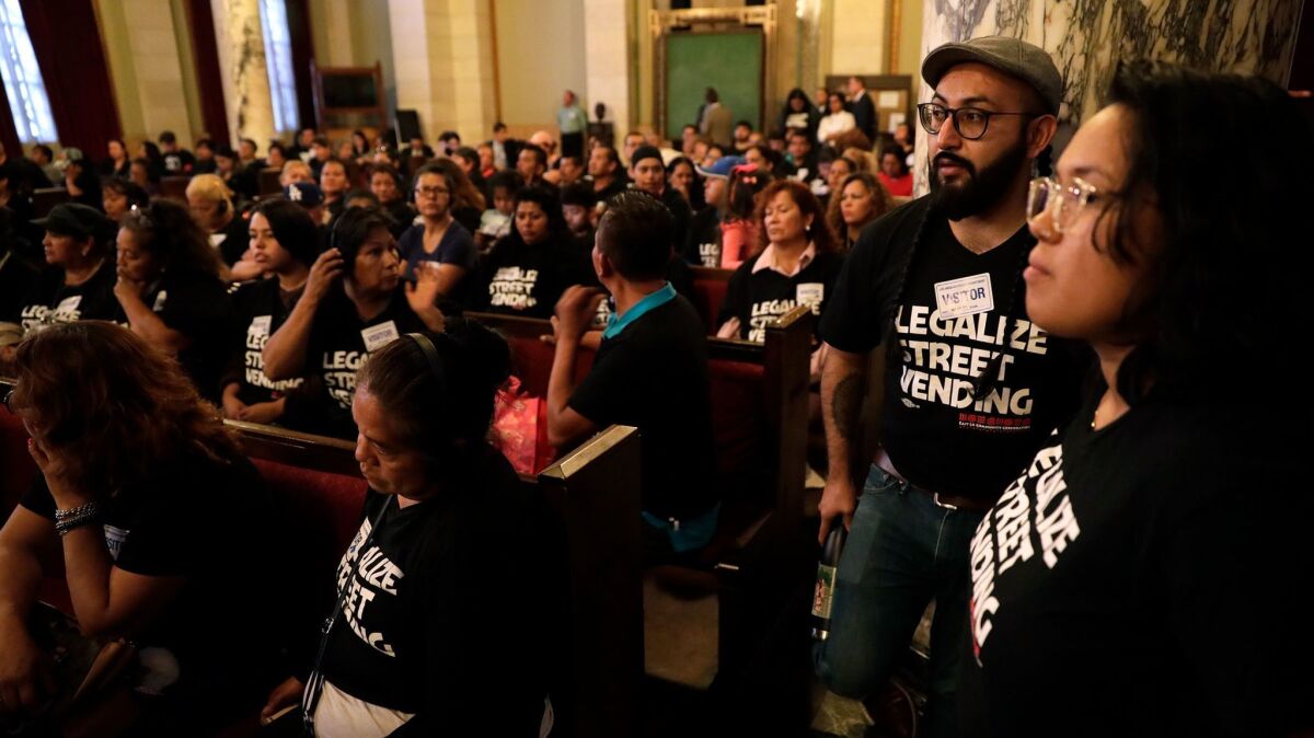 Street vendors and their supporters fill the seats as street vending regulations are discussed at Los Angeles City Hall.