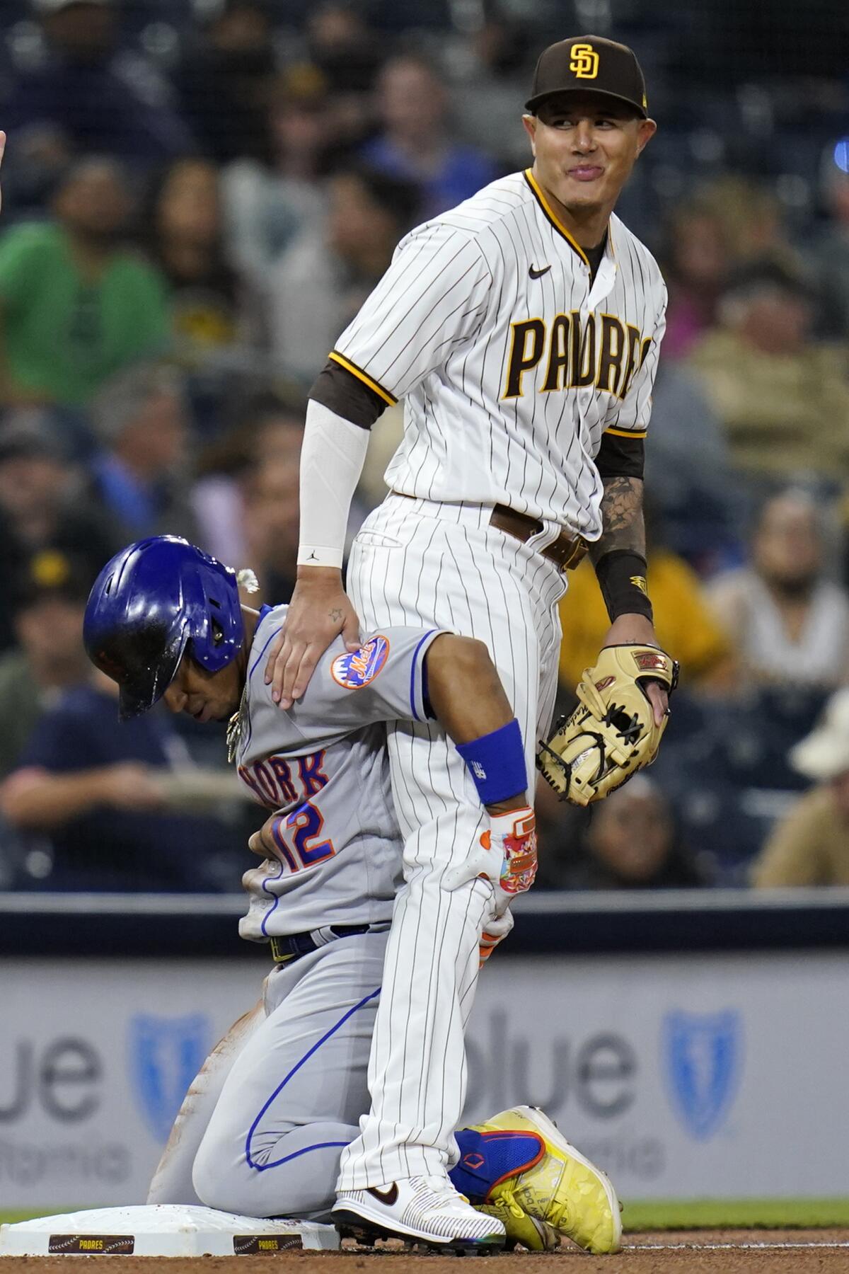 New York Mets' Francisco Lindor, Padres third baseman Manny Machado 