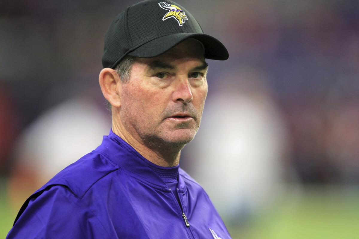 Minnesota Coach Mike Zimmer, shown Nov. 20, had emergency surgery on his eye Wednesday night and won't coach the Vikings on "Thursday Night Football."