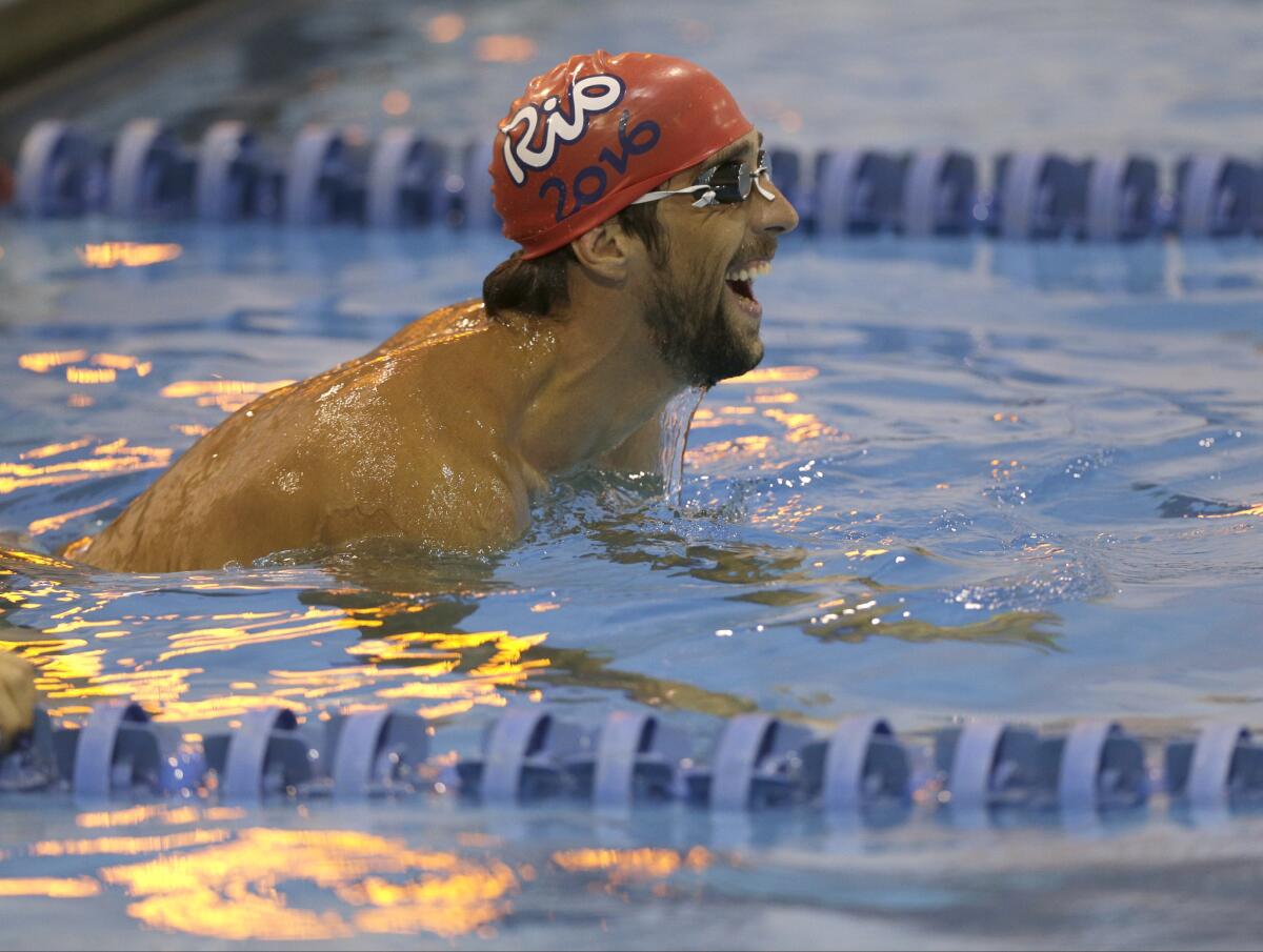 Michael Phelps warms up before the Charlotte Grand Prix swimming event Thursday in North Carolina.