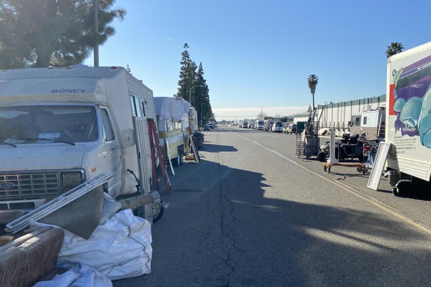 Several RVs are parked on Valencia Drive in Fullerton.