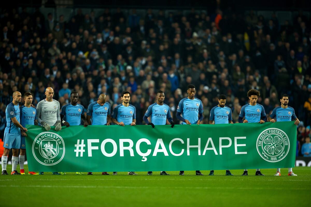 Both Manchester City and Celtic players pay tribute on Dec. 6 to the Chapecoense players and staff who were killed in a plane crash in Columbia in November.