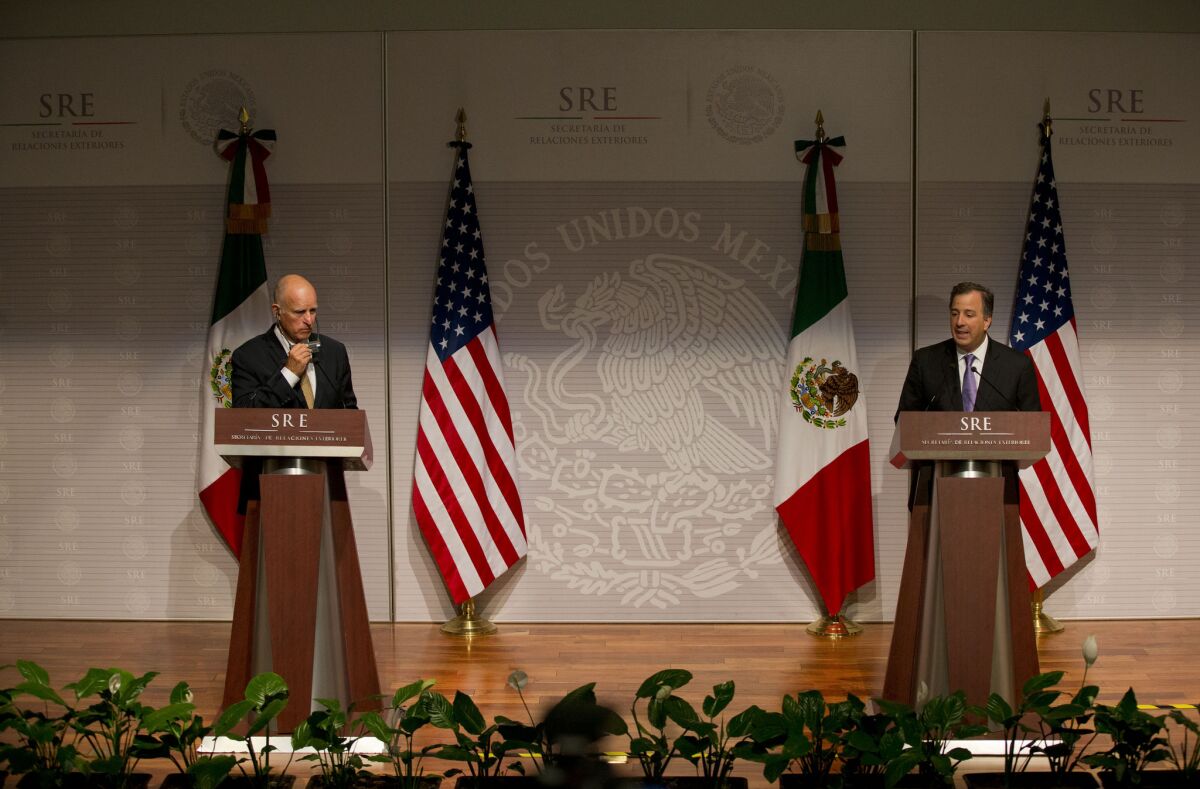 California Gov. Jerry Brown, left, appears at a joint news conference Monday with Jose Antonio Meade, Mexico's secretary of foreign affairs.