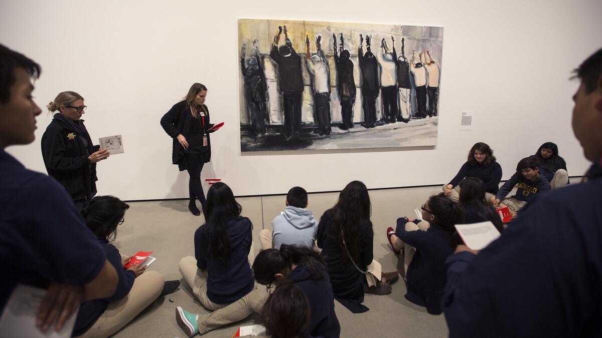 Students from Animo Leadership High study Marlene Dumas' "Wall Weeping" as part of the Art+Rhyme and Art+Story program at downtown L.A.'s Broad Museum. Since the program began in January, 3,200 students have look at art and written about it.