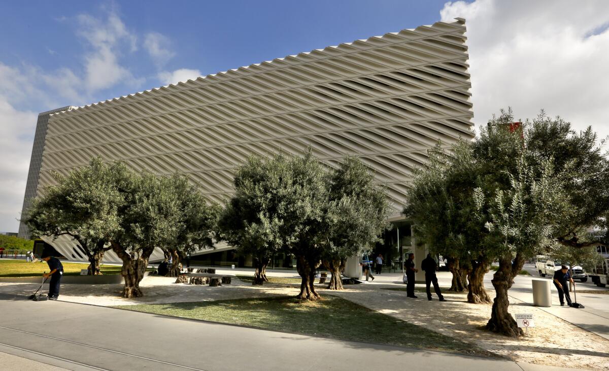 A view of the Broad museum taken from the public plaza, to the southwest, lined with 100-year-old olive trees. The opening of L.A.'s newest institution attracted droves of design writers to the city.