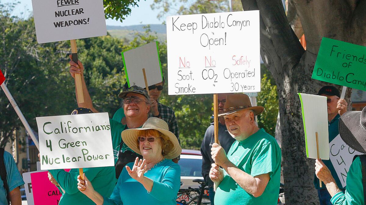 People rally in front of the San Luis Obispo County government building in support of the Diablo Canyon nuclear power plant in San Luis Obispo on March 17, 2016.