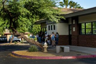 PHOENIX, AZ - AUGUST 1, 2022: On an early August morning, women are lined up outside Camelback Family Planning to try and get an appointment at the only surgical abortion clinic left in the entire state of Arizona on August 1, 2022 in Phoenix, Arizona.(Gina Ferazzi / Los Angeles Times)