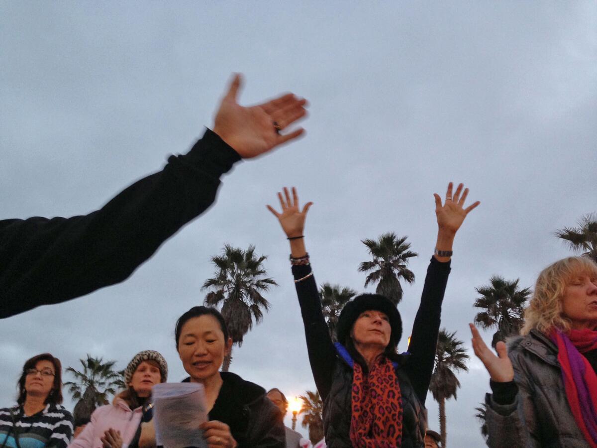 A sunrise Easter service was held Sunday morning at the Huntington Beach Pier Plaza Amphitheater.