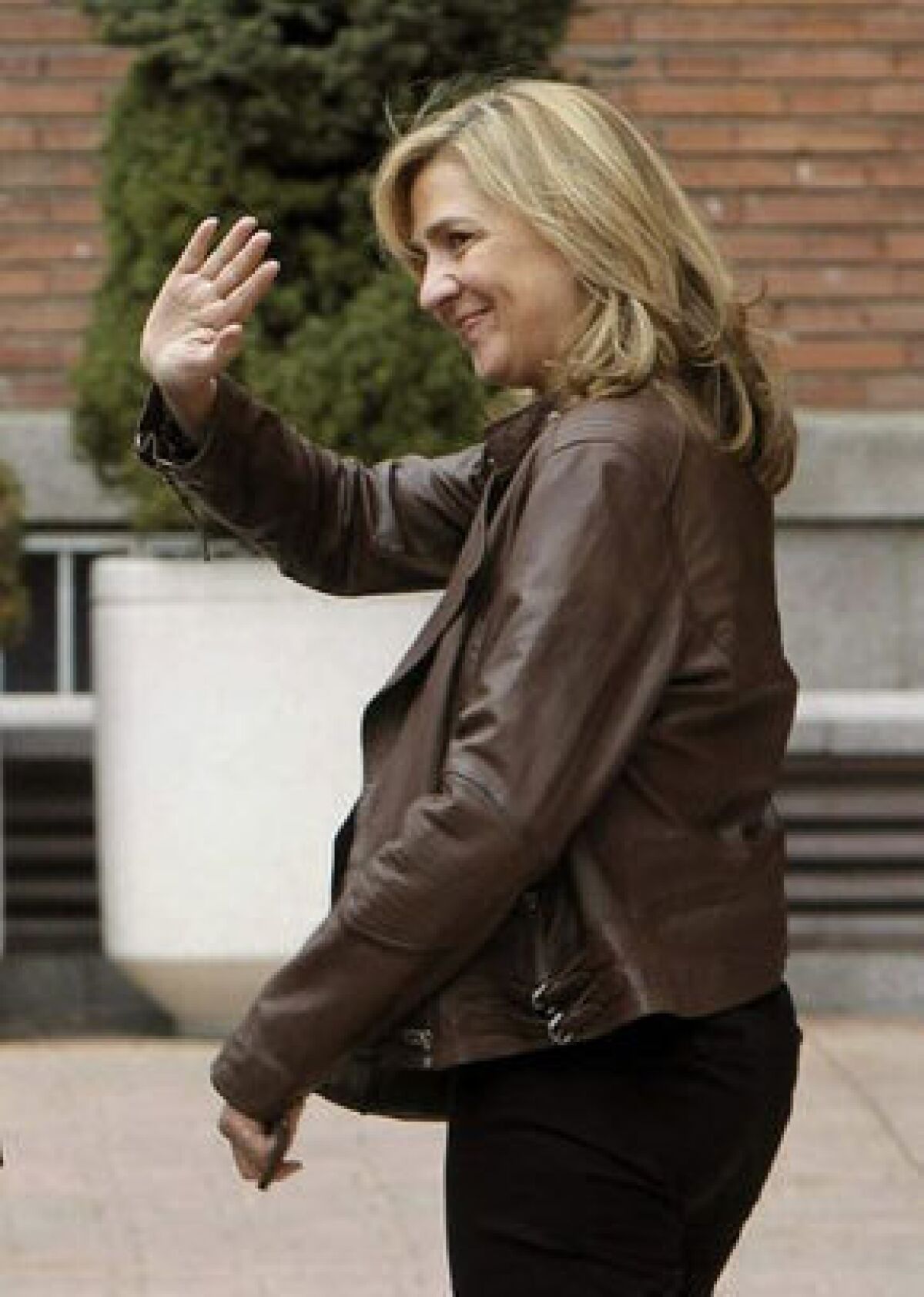 Spain's Princess Cristina, shown in Madrid in March, has been cleared in a corruption probe that has ensnared her husband and thrown a shadow over the royal family.