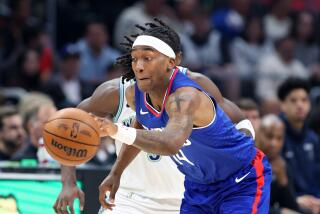 Los Angeles, California March 12, 2024-Clippers Terance Mann steals the ball.