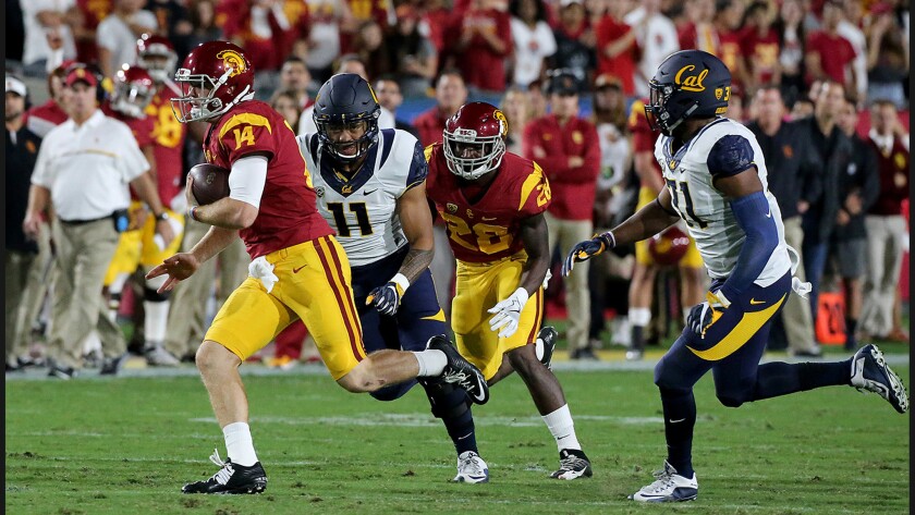 USC's Sam Darnold carries the ball on a quarterback keeper in the first quarter of a game against California on Thursday.