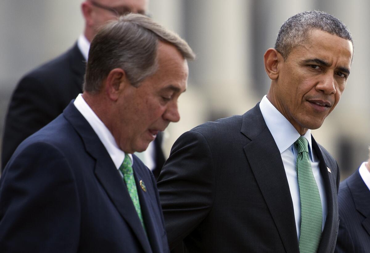 Above: President Barack Obama walks off the first green with House Speaker John Boehner while golfing at Andrews Air Force Base on June 18, 2011. The much publicized game was an attempt to boost bipartisanship, one that apparently failed. Below: Obama and Boehner on Capitol Hill in March 2015.