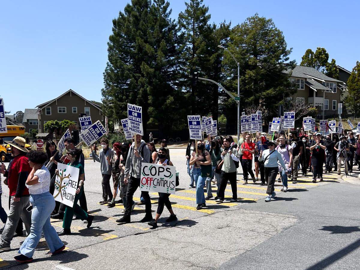 Striking academic workers picket at UC Santa Cruz on Monday.