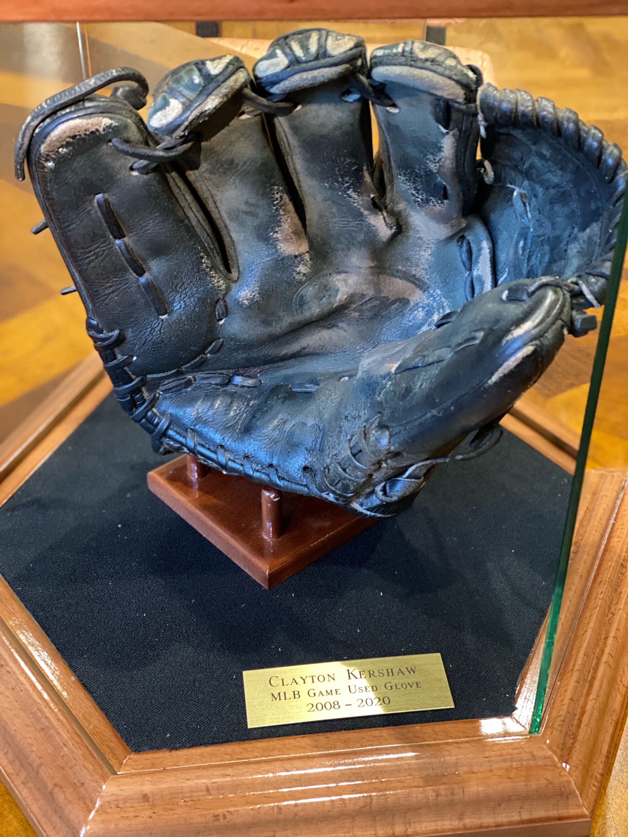 Dodger pitcher Clayton Kershaw's MLB Game Used Glove 2008-2020 trophy. 