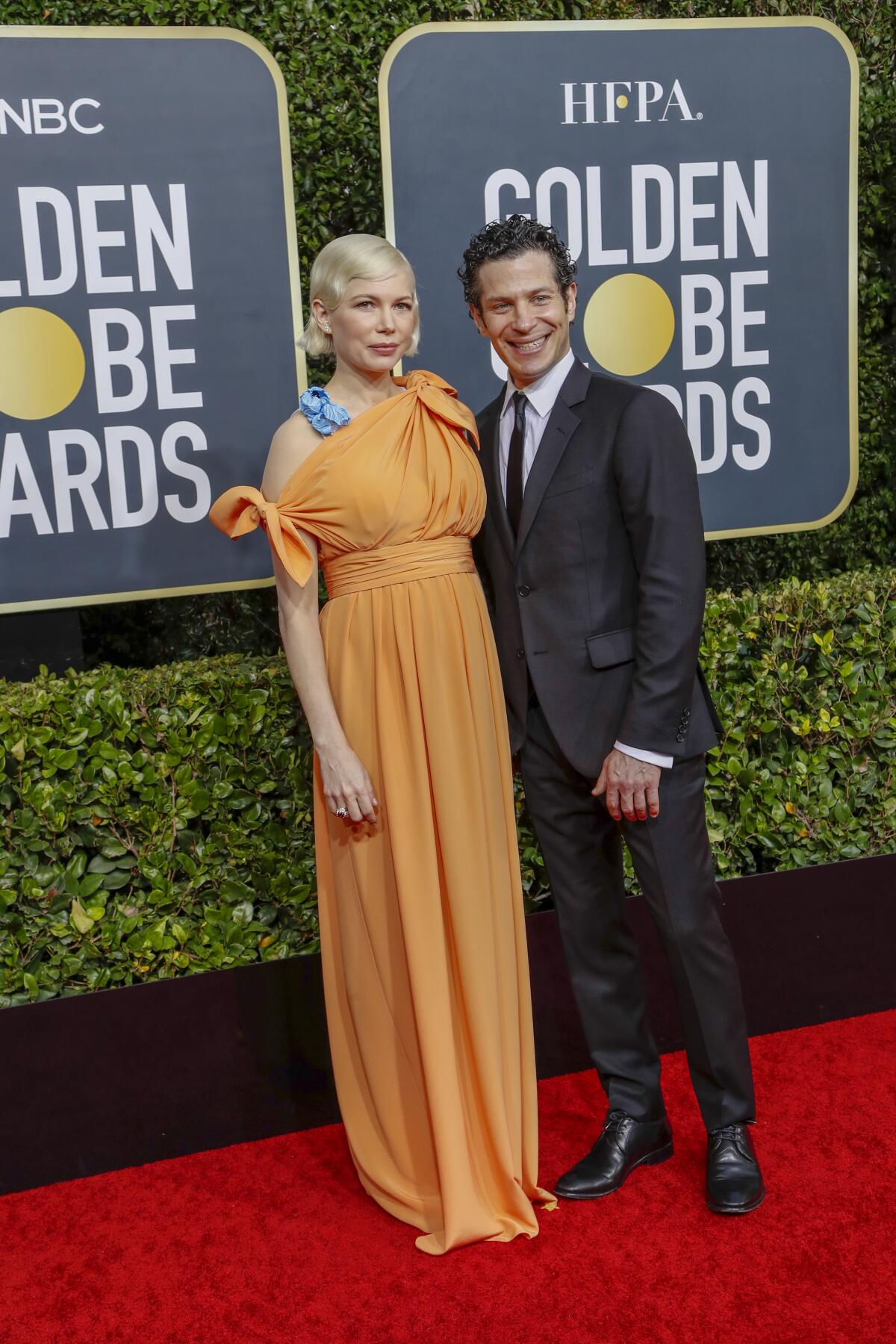Michelle Williams and Thomas Kail at the Golden Globes