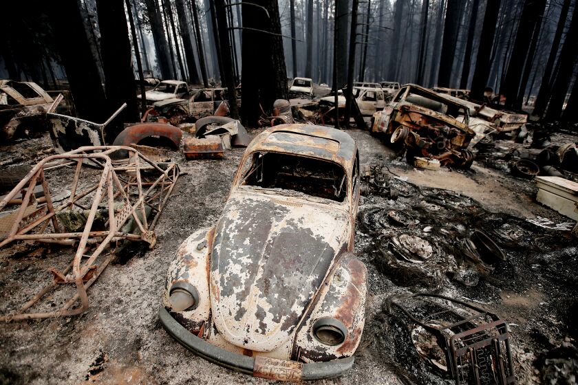 GRIZZLY FLATS CALIF. - AUG. 18, 2021. The Caldor Fire leaves a moonscape of burned forest, homes and vehicles in the unincorporated El Dorado community of Grizzly Flats on Wednesday, Aug. 18, 2021. (Luis Sinco / Los Angeles Times)