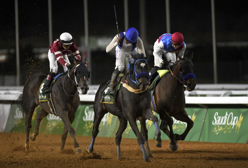 Emblem Road with jockey Wigberto Ramos wins the $20 million Group 1 Saudi Cup.