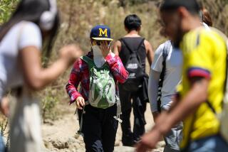 Pasadena, CA, Wednesday, July 3, 2024 - Nguyen Pham braves high temperatures while hiking the Eaton Canyon Trail. (Robert Gauthier/Los Angeles Times)