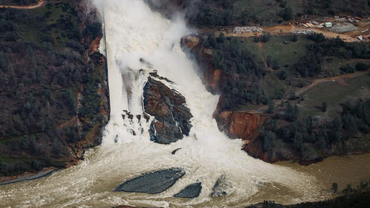 An aerial view of the water flowing out of the Oroville Dam main spillway in February 2017.