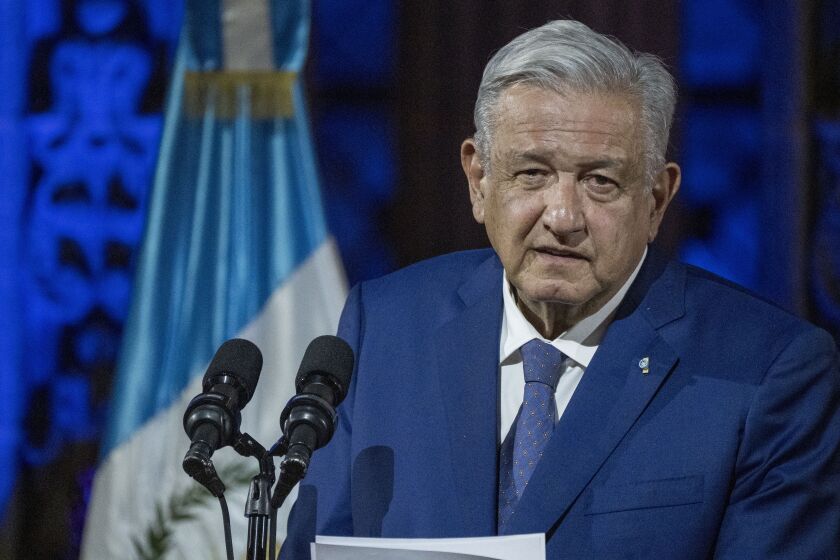 Mexico's President Andres Manuel Lopez Obrador speaks during a joint statement with Guatemalan President Alejandro Giammattei at the National Palace in Guatemala City, Thursday, May 5, 2022. (AP Photo/Moises Castillo)