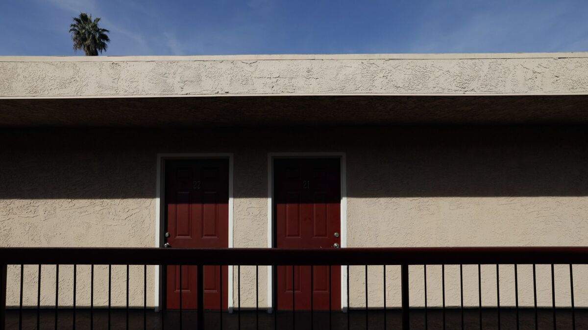 A former motel in South Los Angeles is temporarily being used to house homeless women.