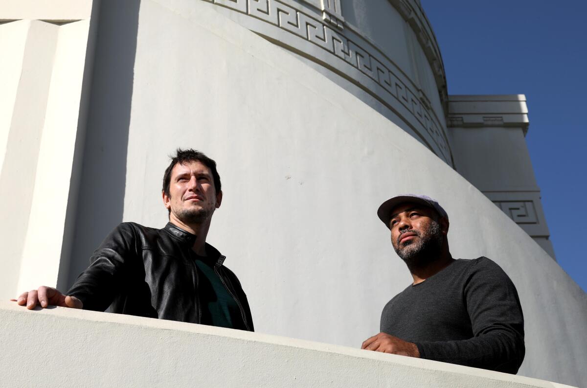 "The Great Grass Race" creator Denis Oliver and director Cosmos Kiindarius at Griffith Observatory. 