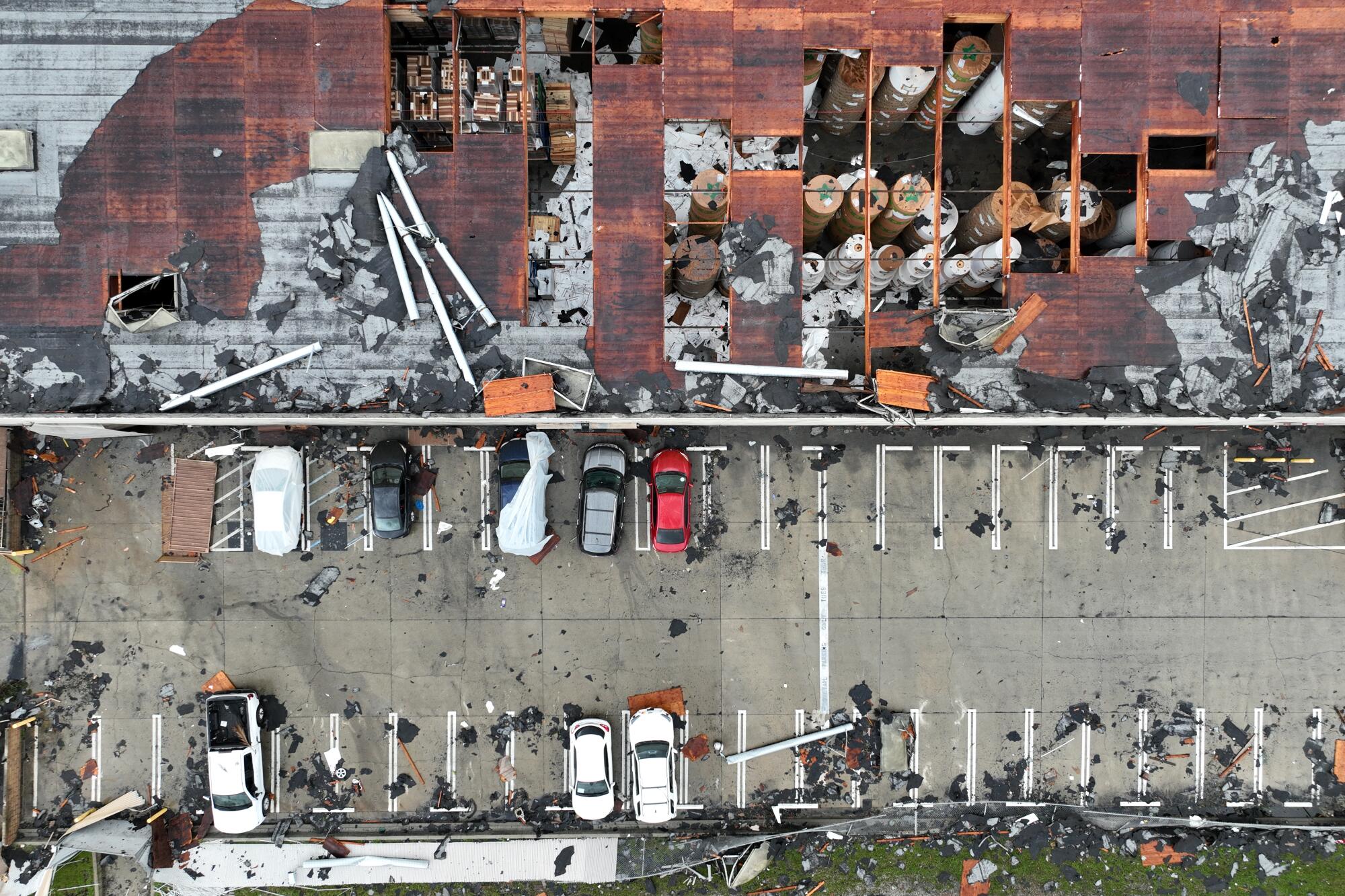 Aerial view of damaged building and debris