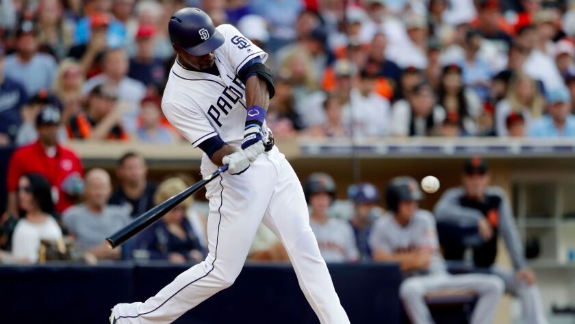 Padres right fielder Jabari Blash swings on a two-run home run during the fourth inning against the San Francisco Giants Saturday, July 15, 2017, in San Diego.