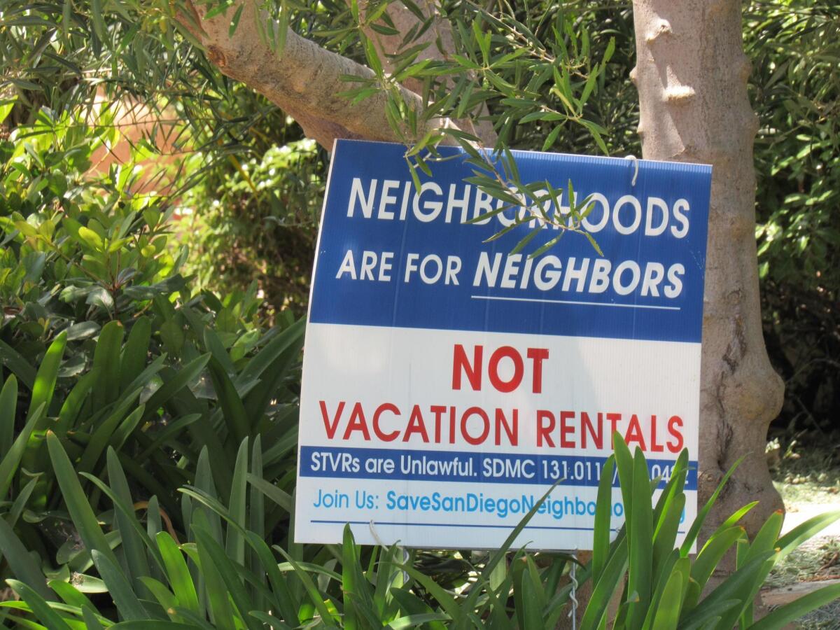 Signs like this have popped up in La Jolla in recent years in opposition to short-term rentals in neighborhoods.