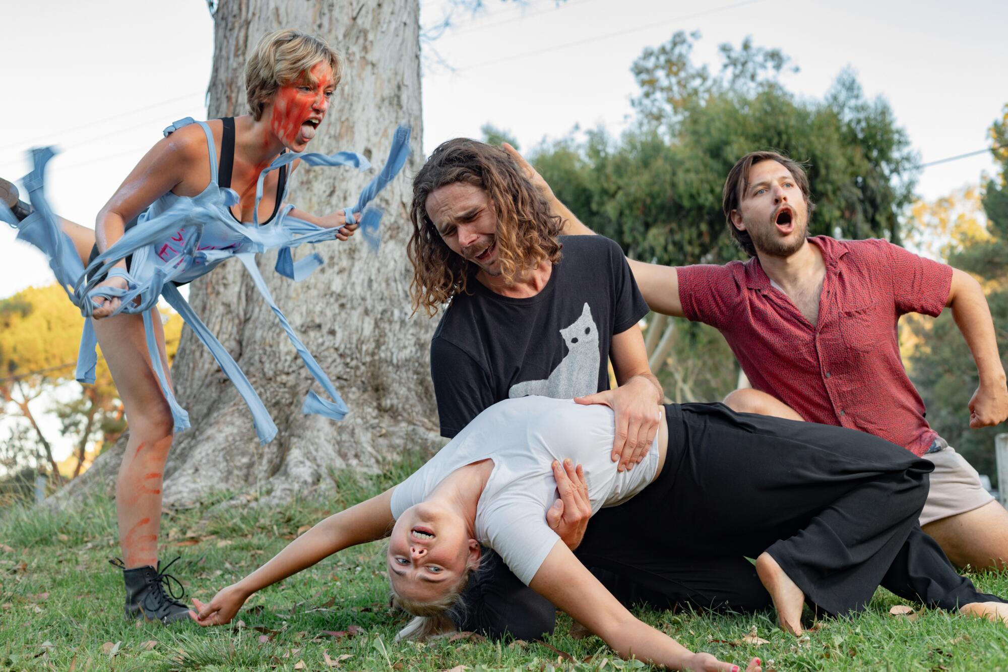 Group of clowns performing in a park