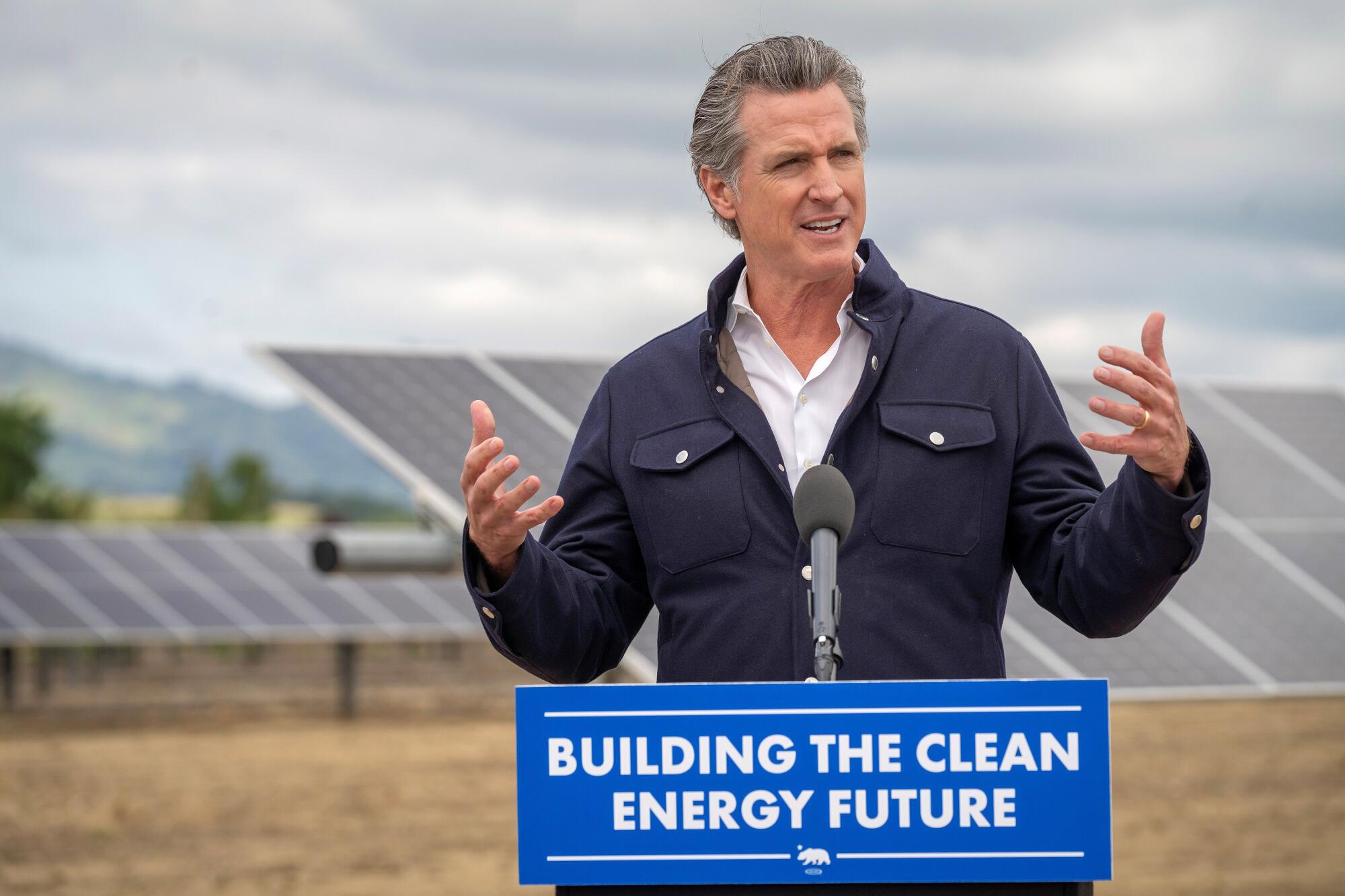Gov. Gavin Newsom speaks at a solar facility.