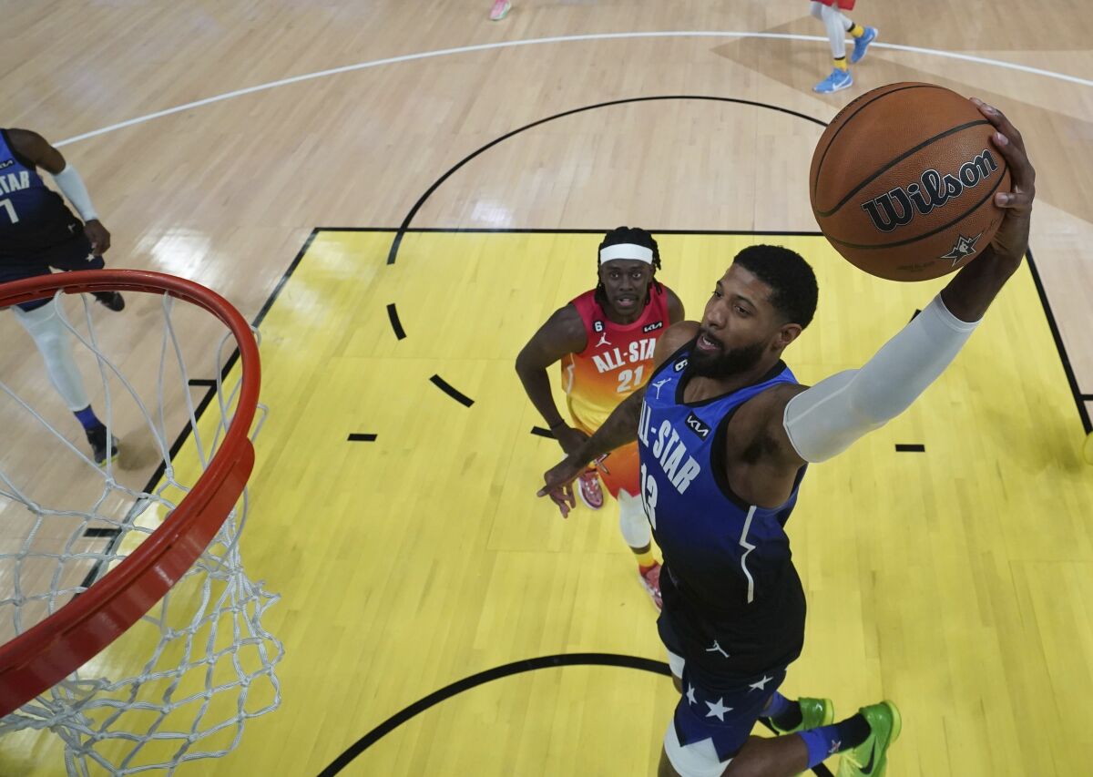 Team LeBron forward Paul George elevates for a dunk during the NBA All-Star Game on Sunday.
