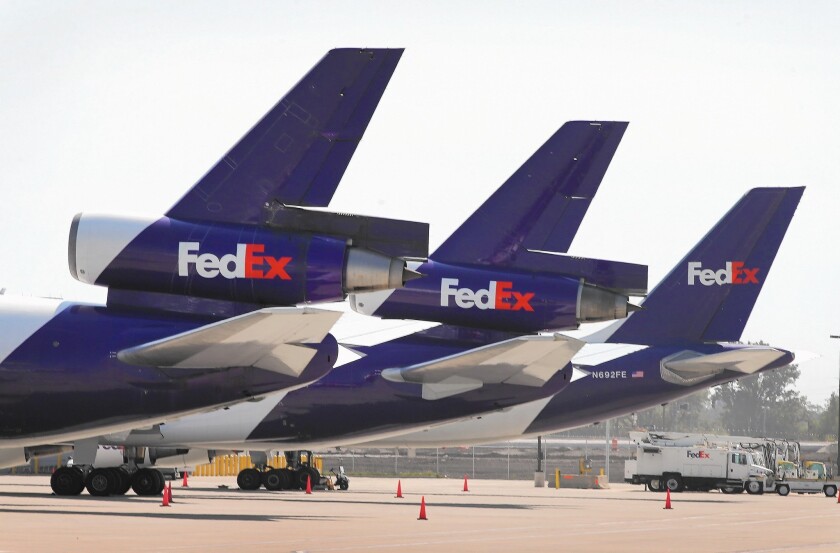 FedEx jets sit at the company's facility at O'Hare International Airport in Chicago.