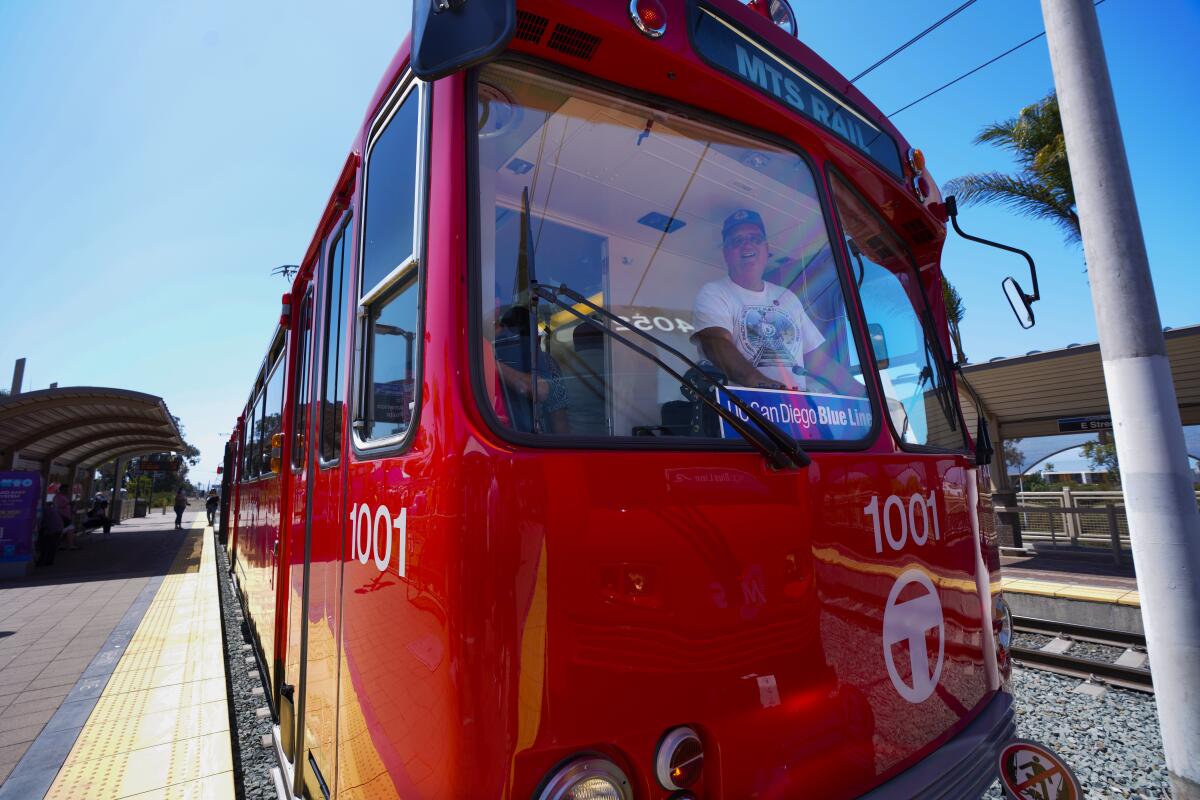 A bright red trolley car