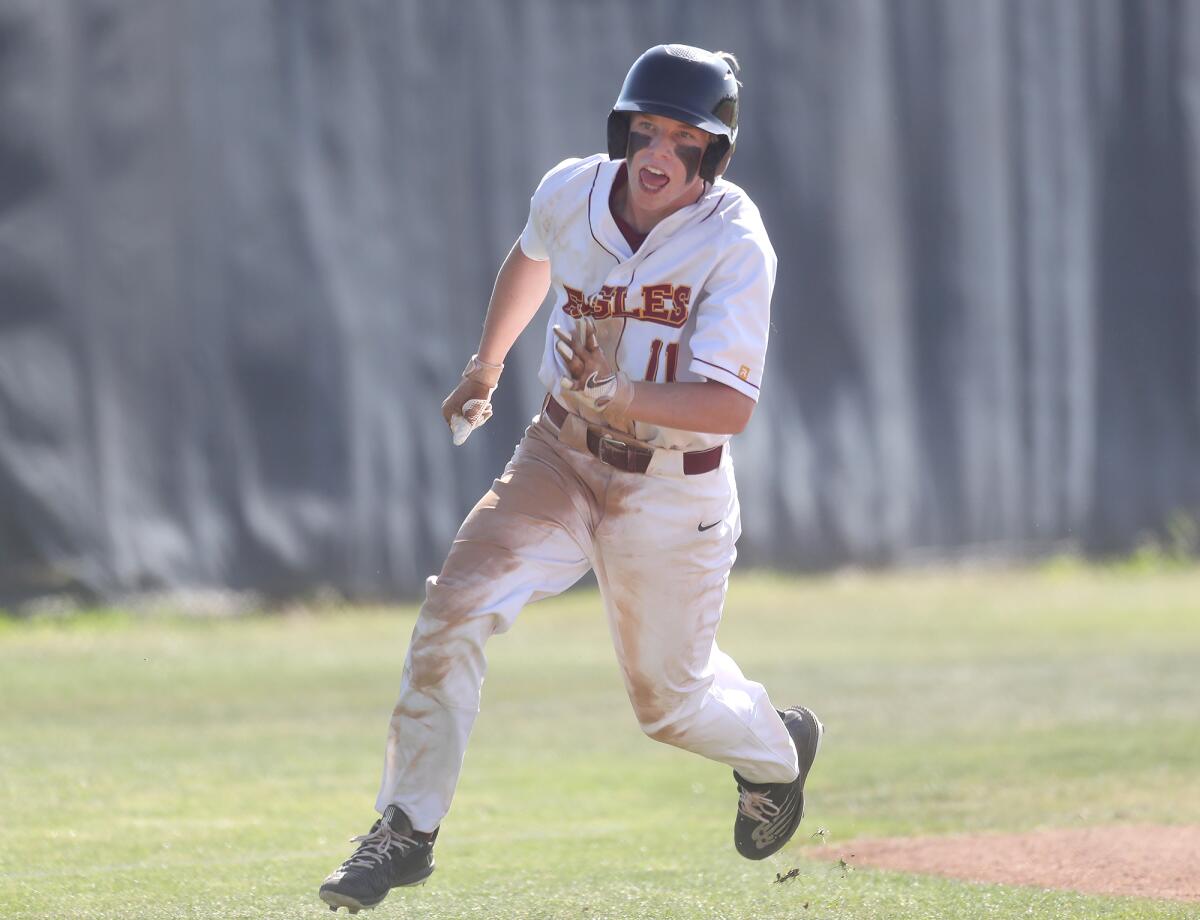 Estancia baserunner John Uchytil rounds third and heads for home against Mendez on Tuesday.
