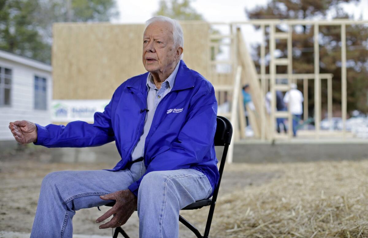 President Jimmy Carter is interviewed at a Habitat for Humanity project site in Memphis, Tenn., on Nov. 1.