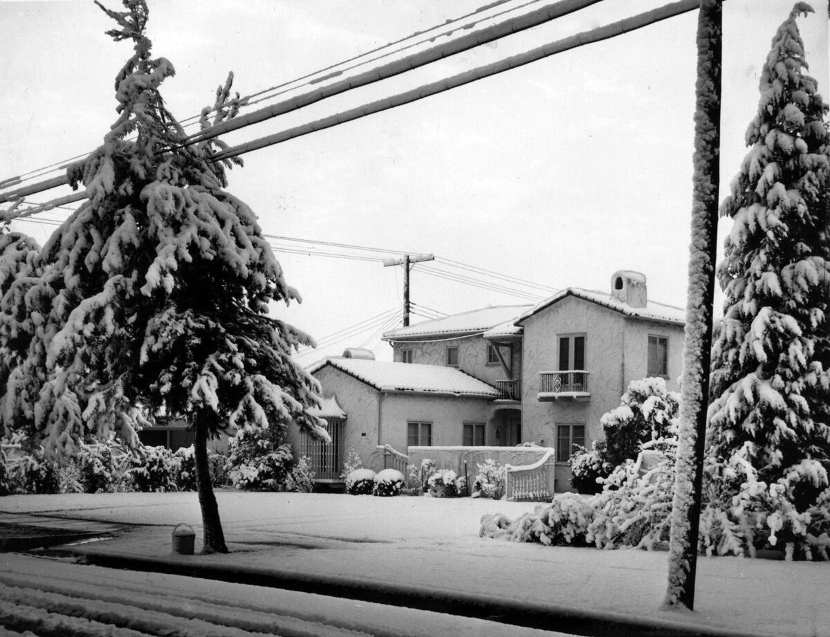 Jan. 11, 1949: Snow covers a home on Opechee Way in the Verdugo Woodlands area of North Glendale.