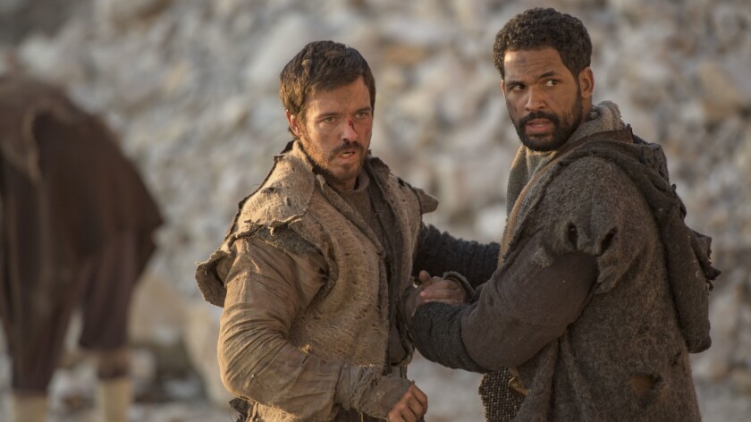 Jake Stormoen, left, and Aaron Fontaine in "The Outpost" on The CW.
