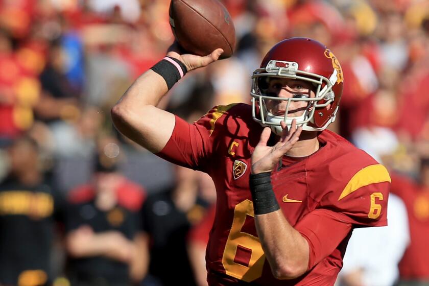 USC quarterback Cody Kessler prepares to pass in a 49-14 victory over Notre Dame on Nov. 29, 2014.