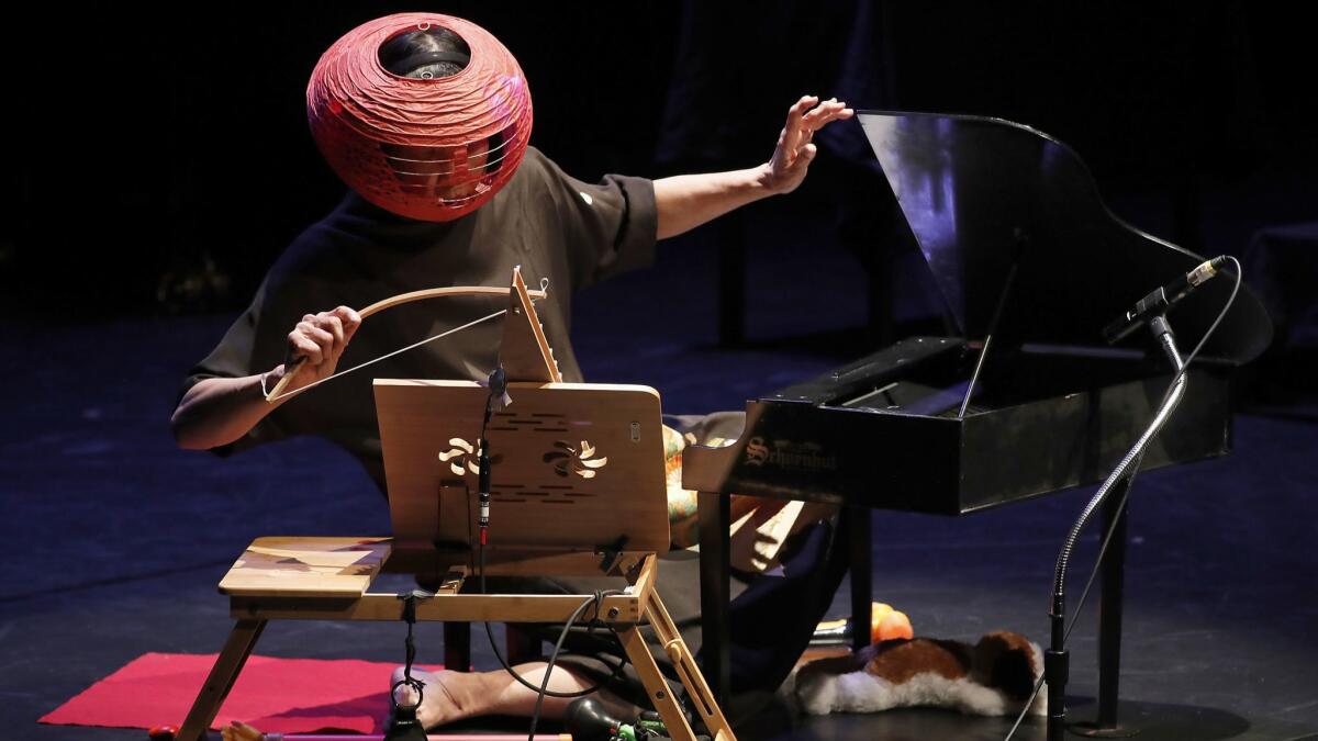 Masked toy pianist Margaret Leng Tan in the West Coast premiere of Phyllis Chen's 'Curios' at REDCAT Thursday night.