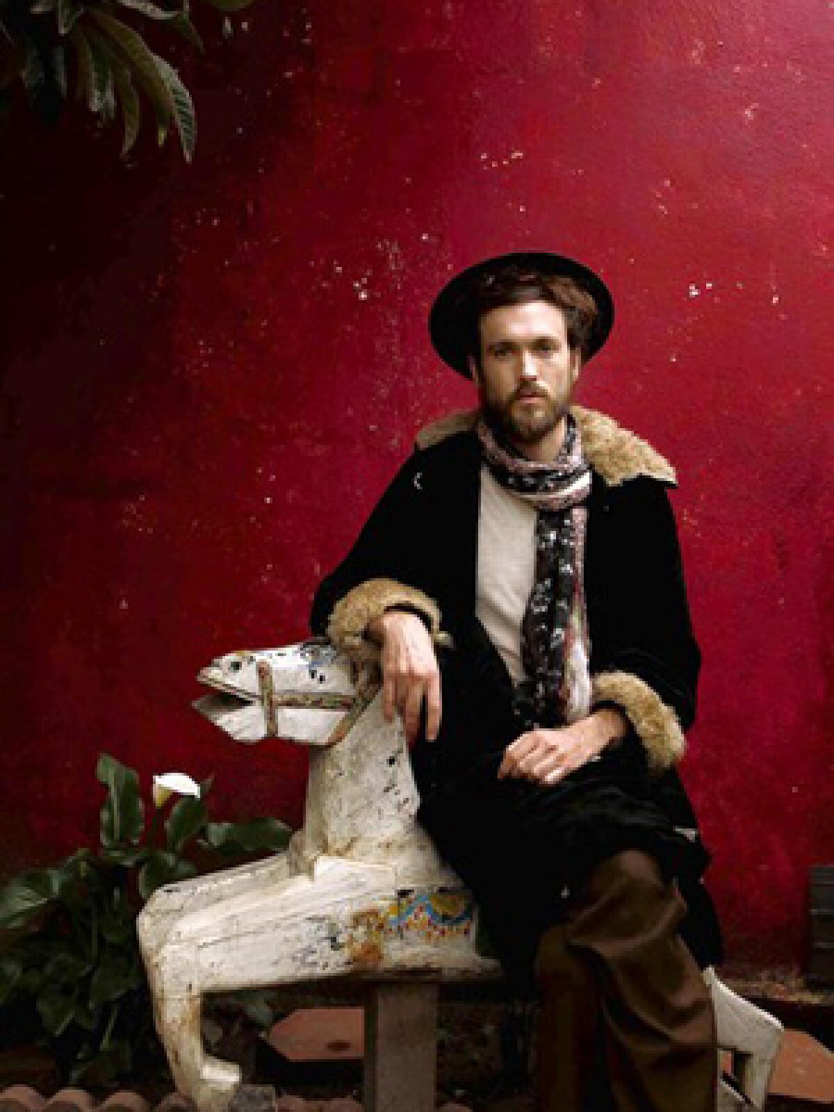 IN THE SADDLE: Alex Ebert sings and plays guitar, keyboards, clarinet, violin, drums and kazoo on his solo album.