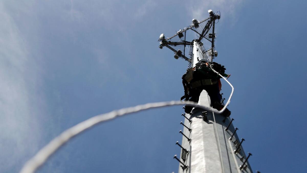 A traditional cellphone tower. Cell tower interceptors, often called "stingrays" or "dirtboxes," tend to be the size of small briefcases and mimic traditional cell towers. (Jeff Roberson / Associated Press)