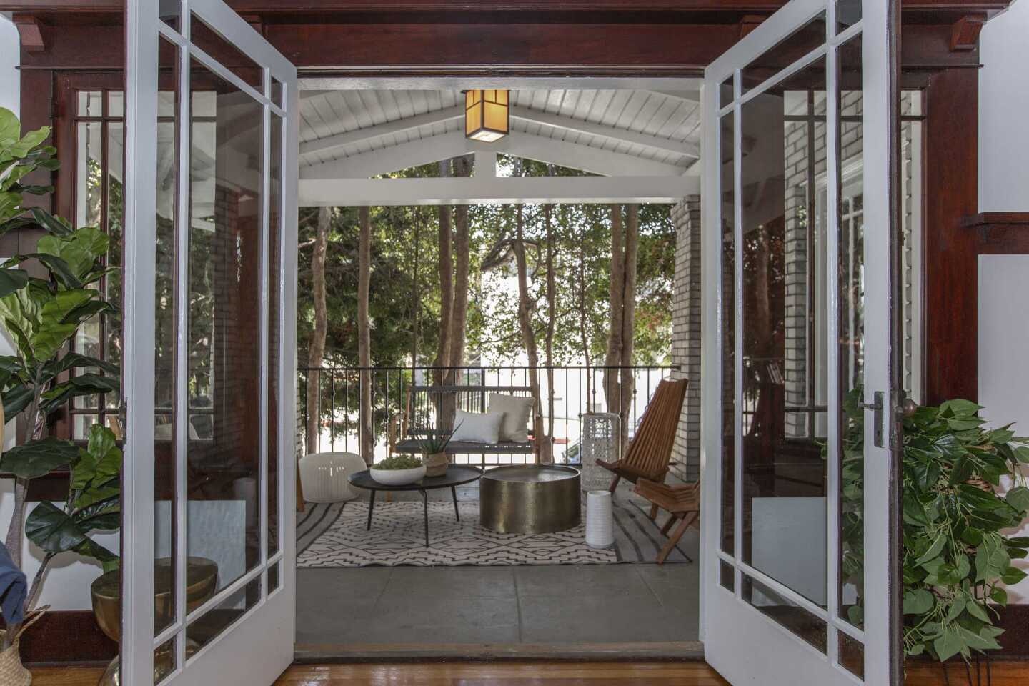 French doors open to a side patio.